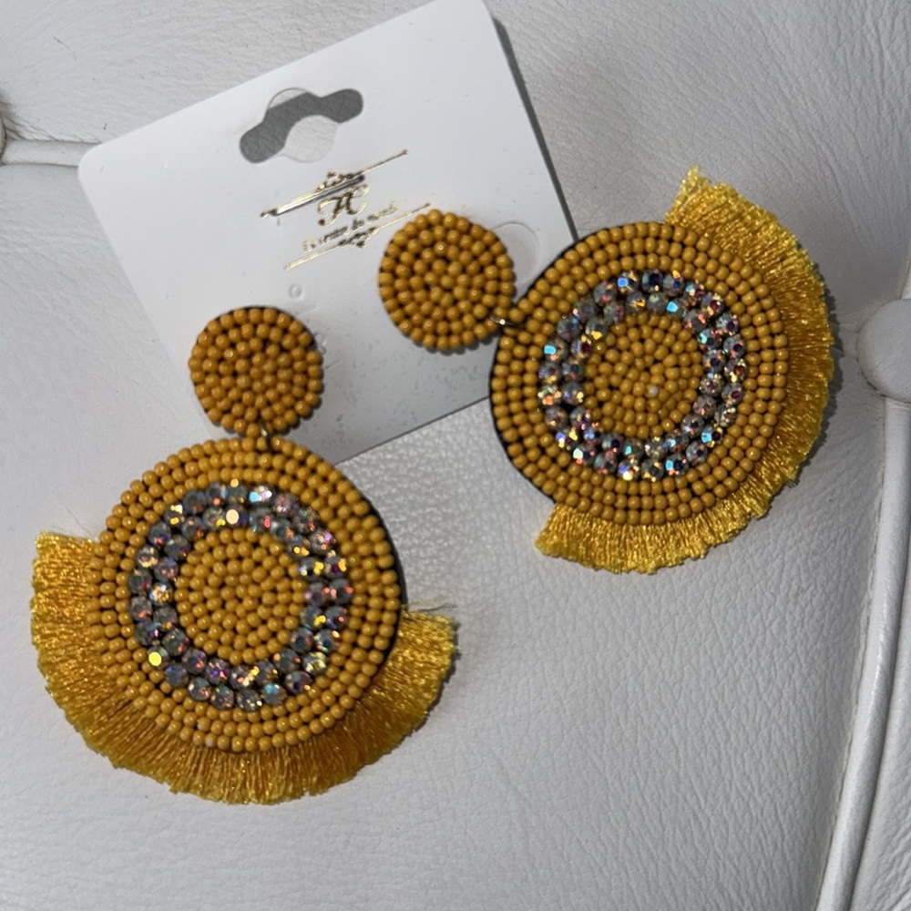 Yellow beaded earrings with rhinestones